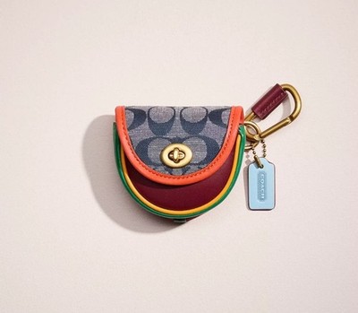COACH Saddle Bag Charm In Signature Denim Colorblock Glovetanned