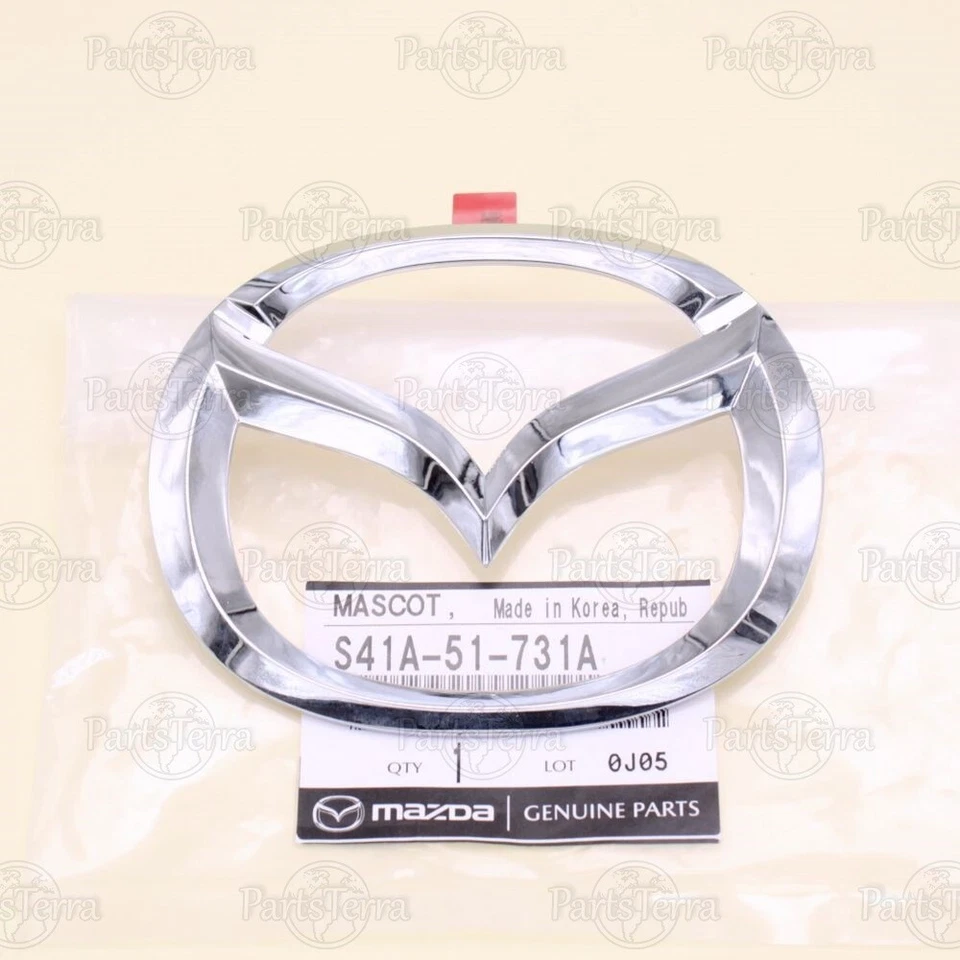 Fabricante de equipos originales Mazda PROTÉGÉ MILLENNIA 2001-03 cromo parrilla delantera logotipo emblema S41A-51-731A Foto 2 de 4