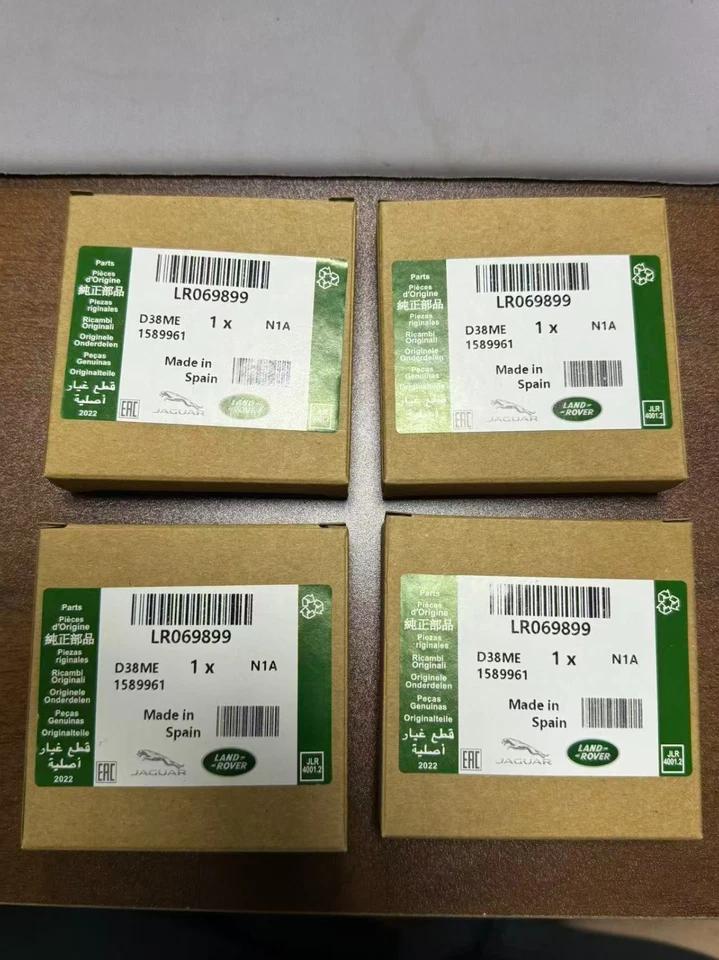 Juego de tapacubos centrales de rueda Land Rover negro con verde ovalado pulido genuino Foto 2 de 4