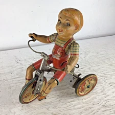 Vintage 1930's tricycle wind up Tin Kiddy Cyclist Unique Art Manufacturing Co.