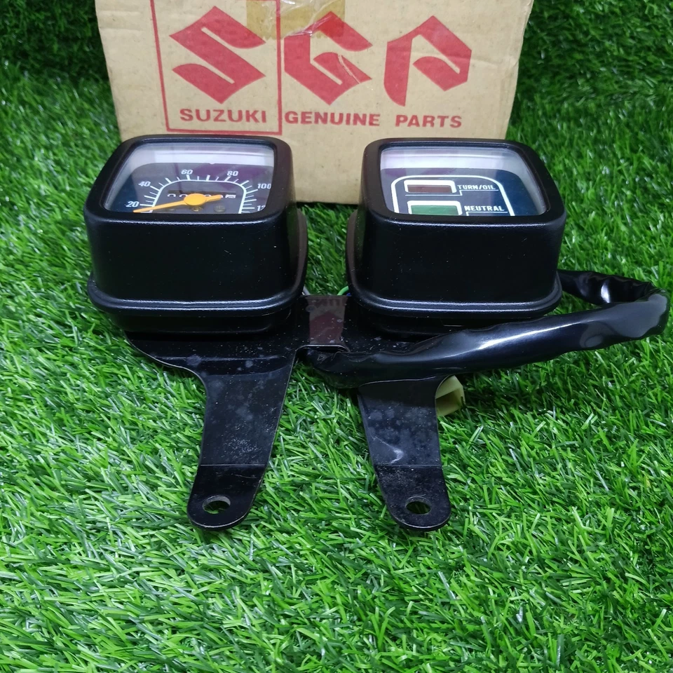 Conjunto de velocímetro de colección Suzuki A100 TS100 genuino OEM 34100-23390L000 NOS raro Foto 3 de 4