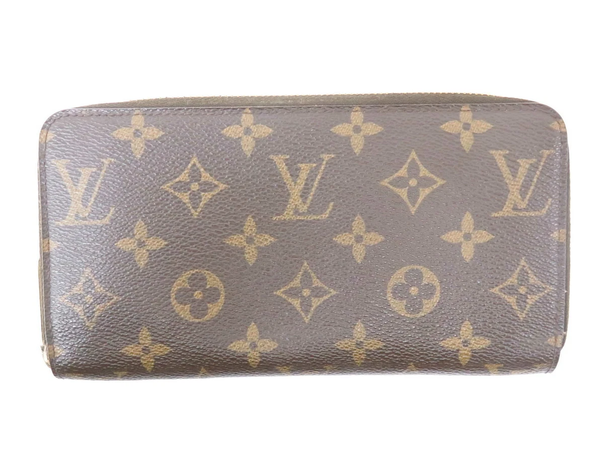 Louis Vuitton Zippy Wallet Canvas Wallet (pre-owned) in Brown