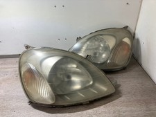 COPPIA FARI ANTERIORI LATO PASSEGGERO E GUIDA TOYOTA YARIS 2001