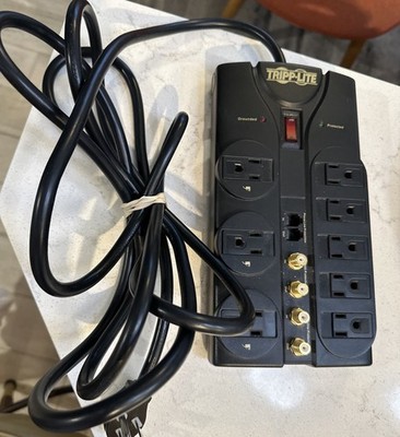 Tripp Lite 8 Outlet Audio Video Surge Protector Tel Modem Coax 10ft Cord AV810