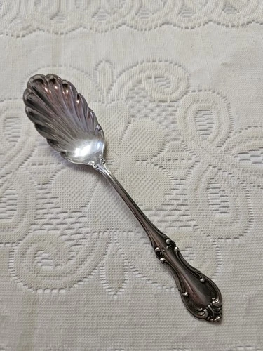 VTG International Sterling Silver Joan of Arc Sugar Shell Serving Spoon.