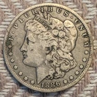 1886-O Morgan Silver Dollar  VG .900 Silver
