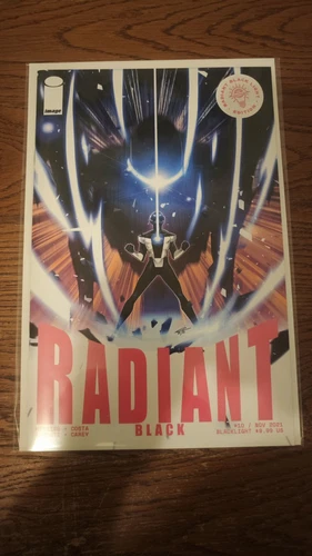Radiant Black #10 Blacklight Edition NM - Shipped Bagged and Boarded ✅ Ad2