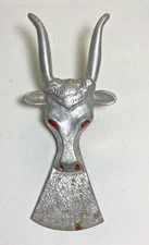 Vintage cast aluminum bull head boot-jack with red accents