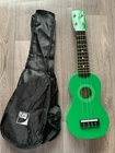 Green Ukulele, Small, Soprano,Nylon Strung  With A Gig Bag & A Stand RRP £41.99.