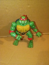 Vintage 1996 Teenage Mutant Ninja Turtles Rapid Recoilin' Raphael Action Figure.