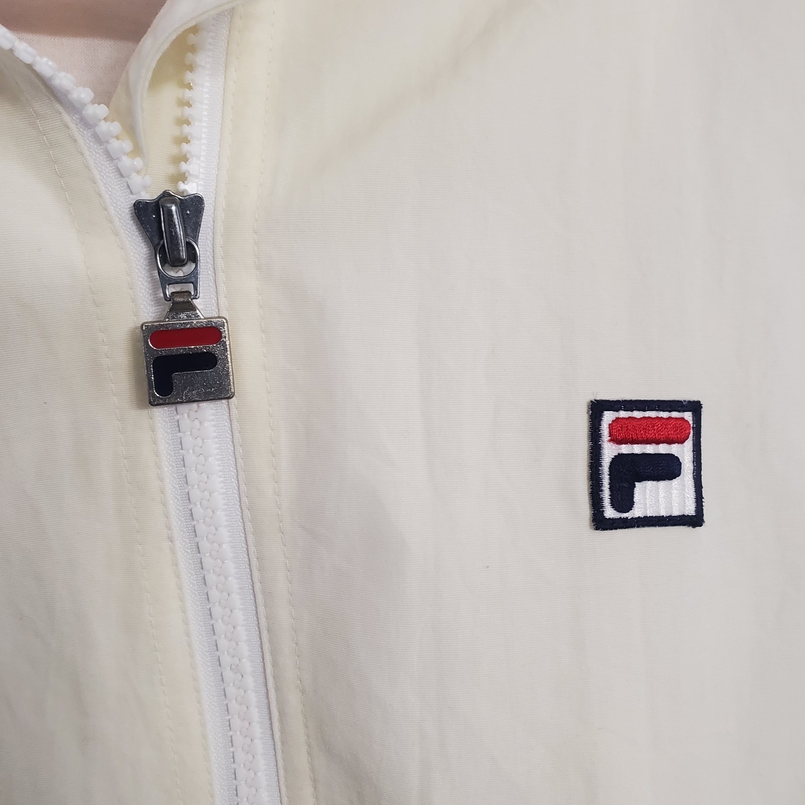 FILA Giacca a vento uomo panna blu e rosso golf sport cappuccio nascosto Lg