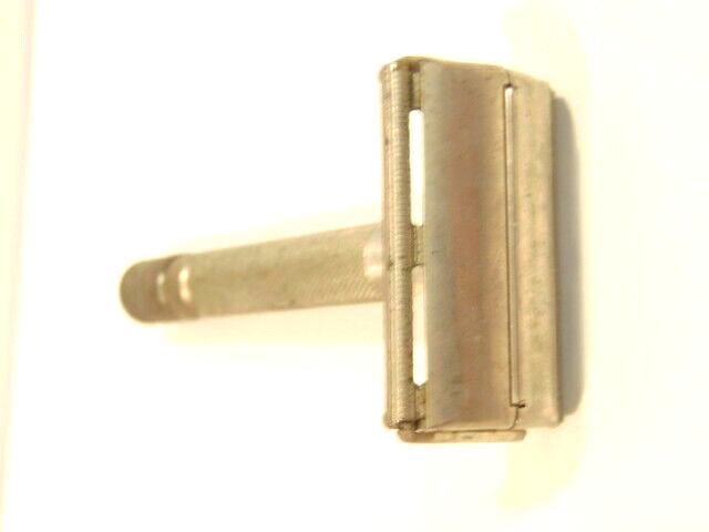 older Gillette safety razor;  marked X-4 on back of shaving head