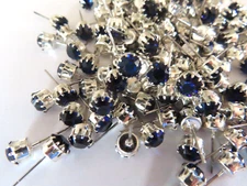 24 Swarovski Rhinestone 29ss Dk. Sapph/tiff. set sterling plate post earrings.