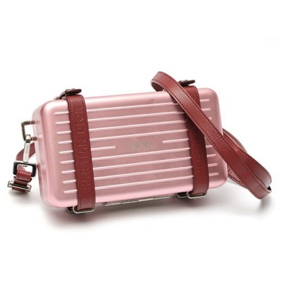 rimowa dior collab