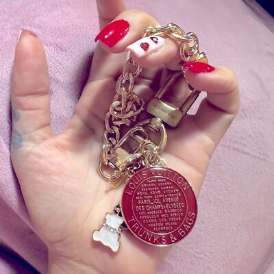 Louis Vuitton Burgundy Trunks and Bags large Charm on authentic LV