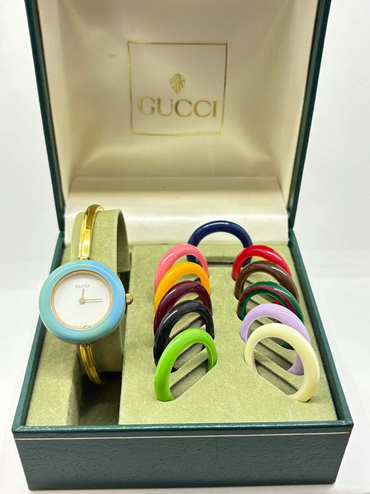 [Exc+5 avec boite] Montre GUCCI lunette changeante 11/12.2 12 couleurs or occasion fonctionne