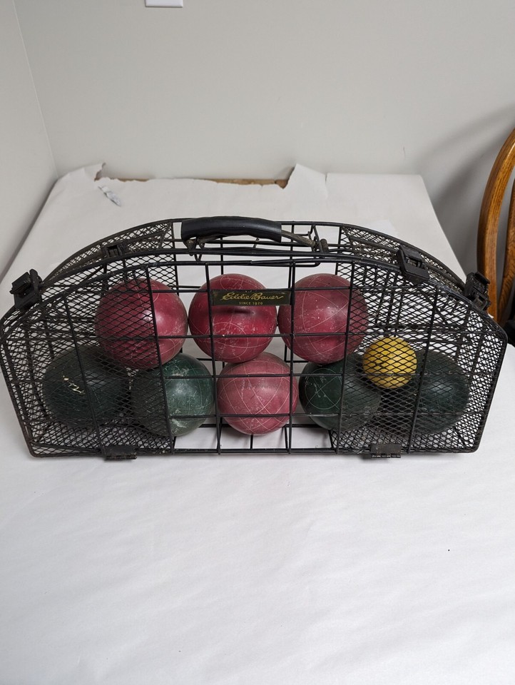 VINTAGE EDDIE BAUER COMPETION BOCCE BALL SET IN A STEEL WIRE CARRYING
