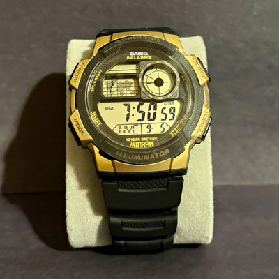 Casio AE-1000W Digital Quartz Illuminator World Time Alarm 100m Black/Gold