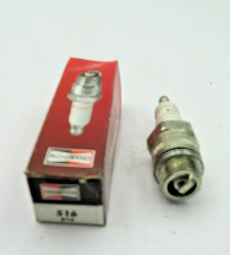 One Champion 516 Spark Plug in Box
