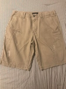 ripped khaki shorts