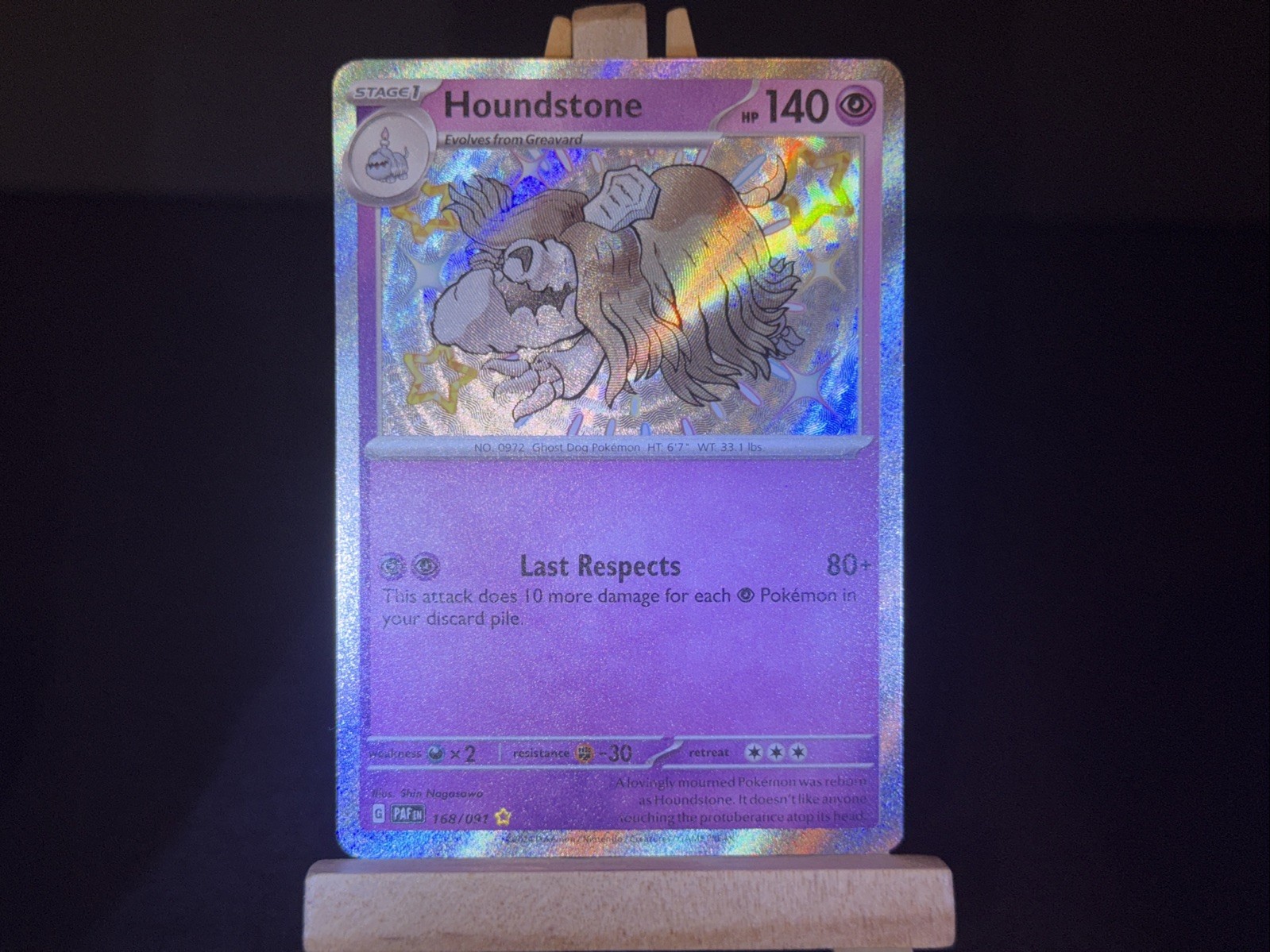 Houndstone 168/091 Sv: Paldean Fates Holo