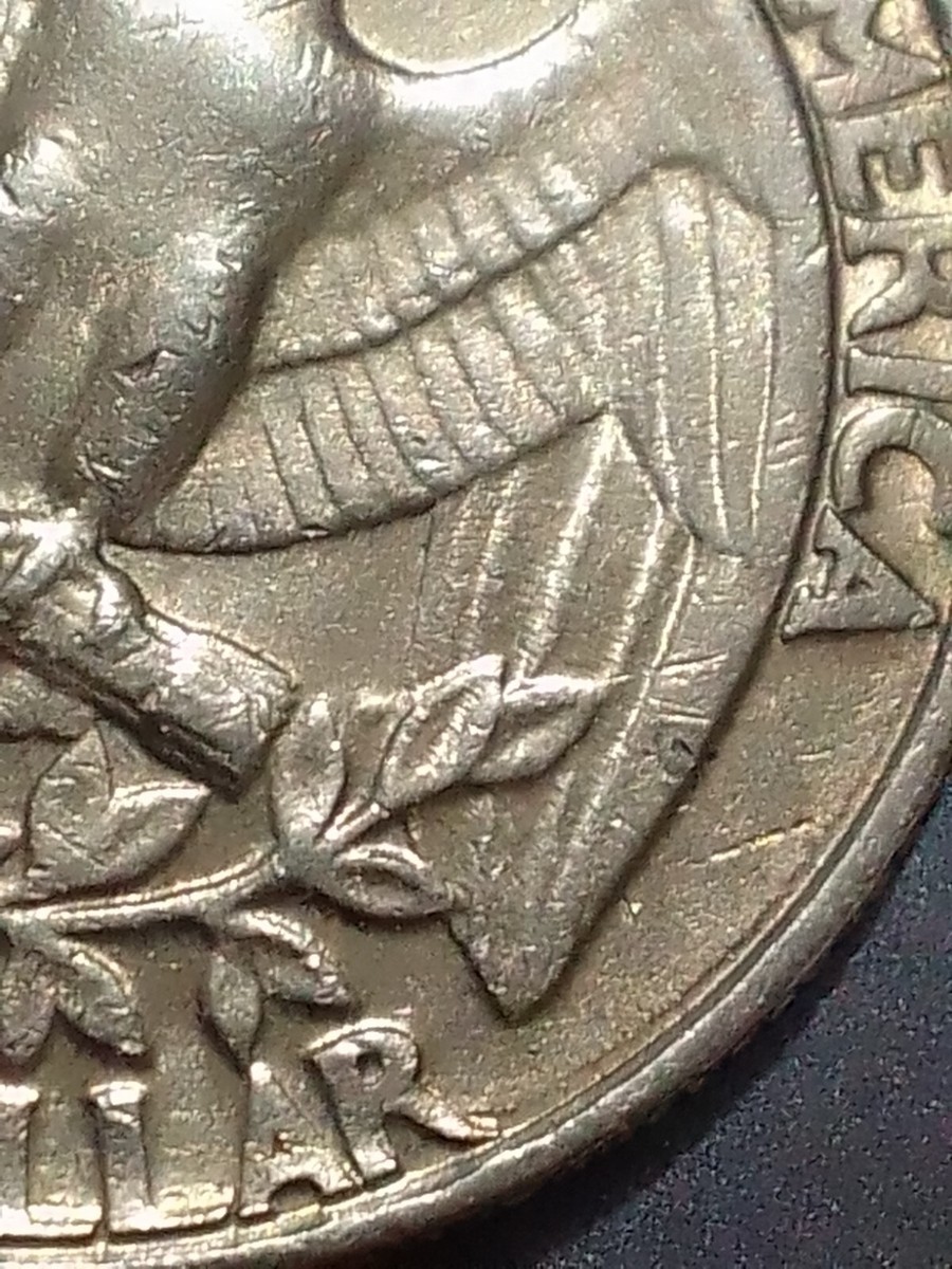 1986 Washington Quarter With Extra Leaf Under The Eagle and