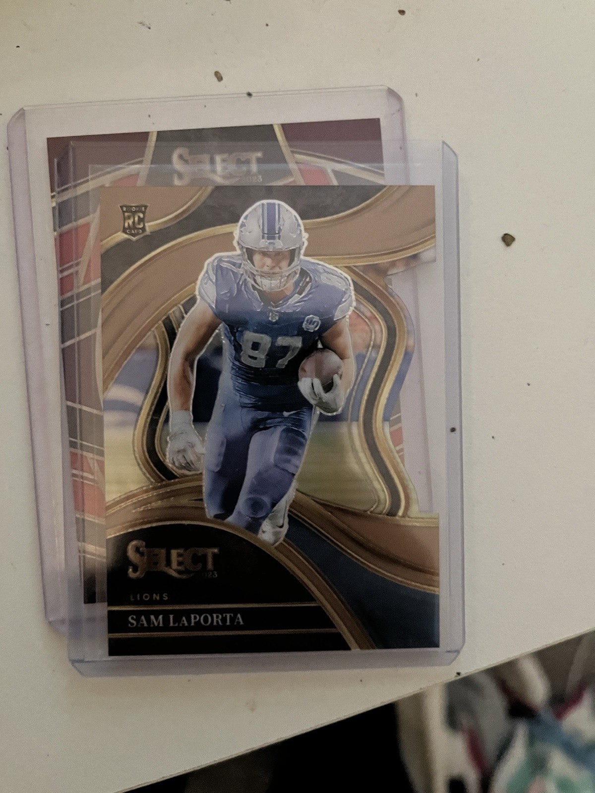 2023 Panini Select - Club Level Sam LaPorta #221 Copper Prizm Die-Cut /299 (RC)