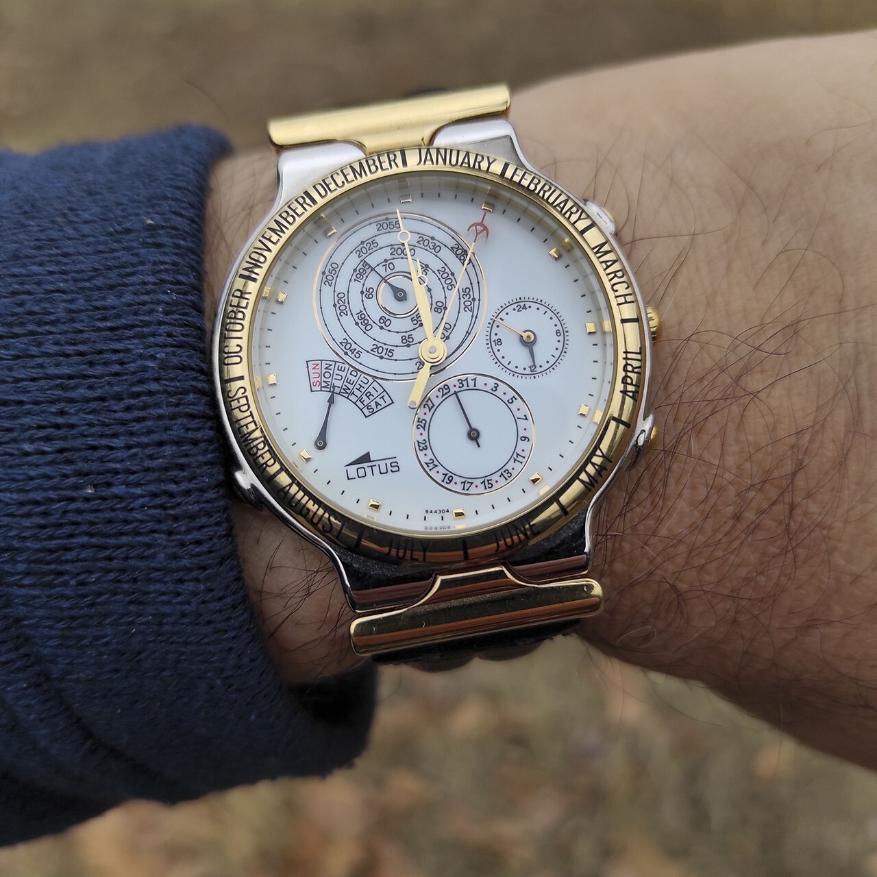 Reloj hombre calendario perpétuo LOTUS acero y dorado. Como nuevo