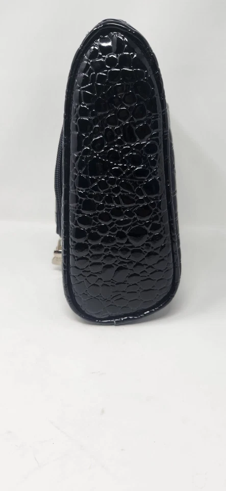 Kathy Van Zeeland Elegant cosmetic bag, very easy to travel with by hand. Foto 4 de 4