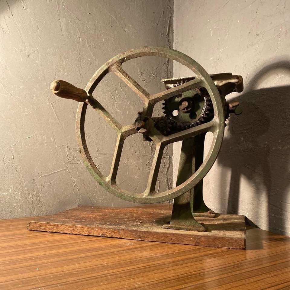 A genuine Showa-era Japanese hand-cranked noodle maker — a functioning piece of culinary history that still cranks out fresh ramen or soba.
