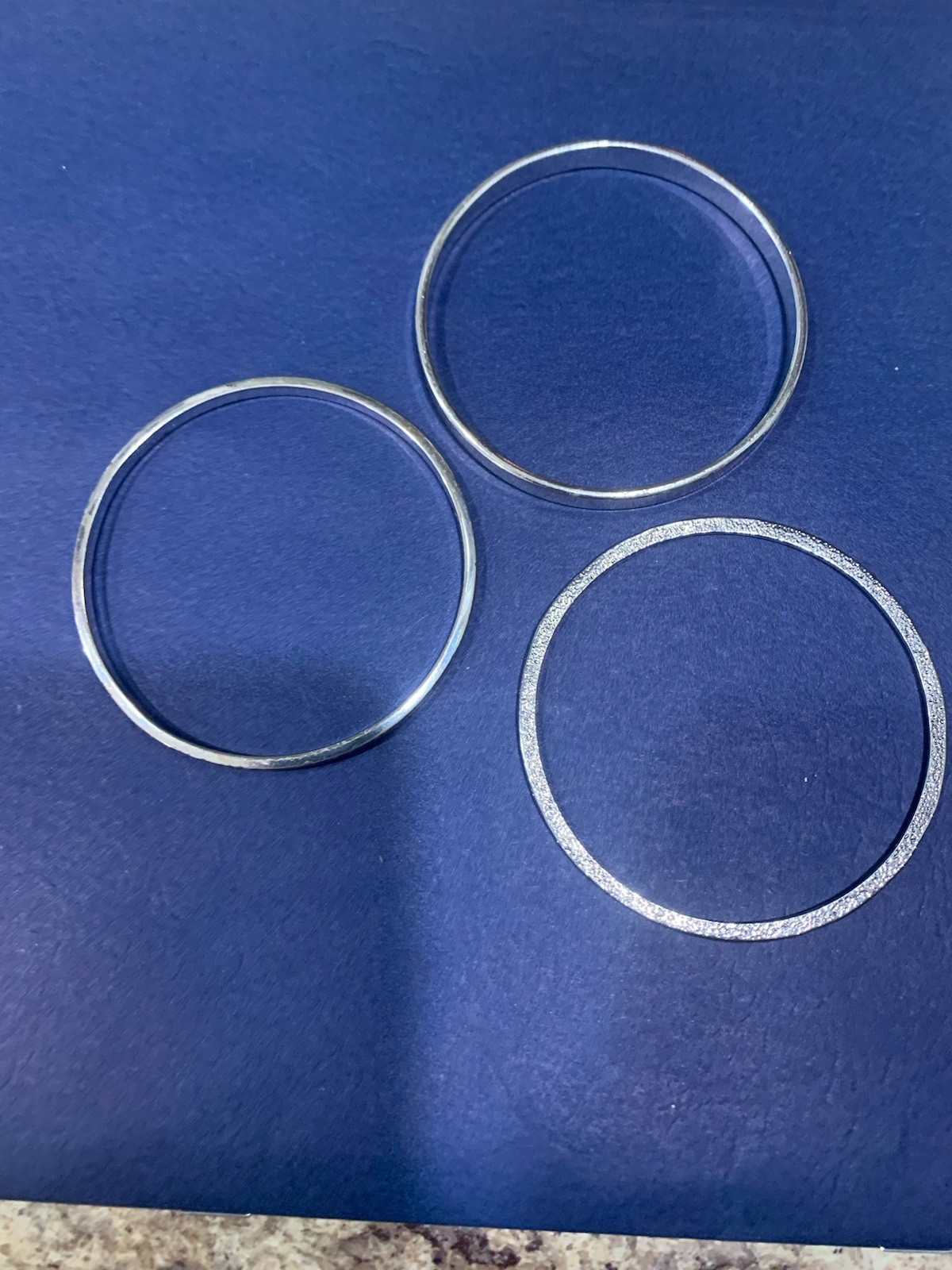 Three bangle bracelets Silvertone - image 1