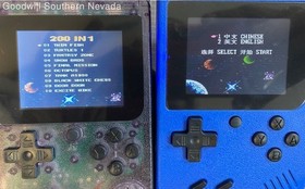 Assorted Lot Of Merkury Portable Gaming Consoles