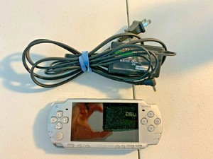 Sony PSP 2000 (Silver) Value Bundle w/ OEM Charger & 1 GB Memory Card