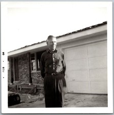 Vtg Snapshot Smiling Man in Work Shirt By Garage Brick House Feb 1964