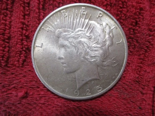 1925 Philadelphia Liberty Peace Dollar  V. fine to AU.  Excellent