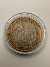 2003 UK £2 coin commemorating the 50th Anniversary of the Discovery of DNA