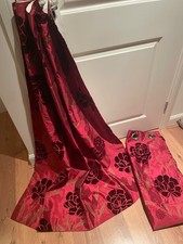 Eyelet maroon with vevlet patterns lined curtains. approx 45 x 53 inches. lined