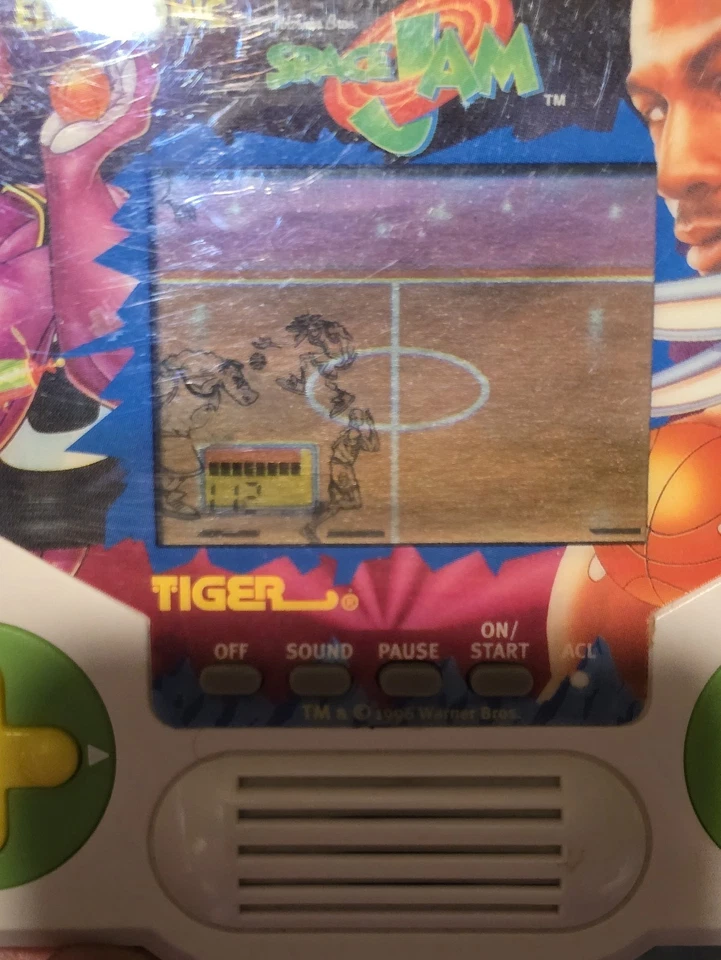 Juego LCD Tiger Electronics Space Jam 1996 de colección con monedas de coleccionistas probadas funciona usado en excelente estado Foto 2 de 4