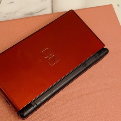 Nintendo DS Lite Handheld System for Nintendo DS, Red/Black, Headphone Jack.