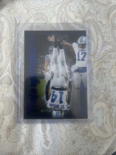 2025 Panini Luminance Football Blue Amon-Ra St. Brown #7
