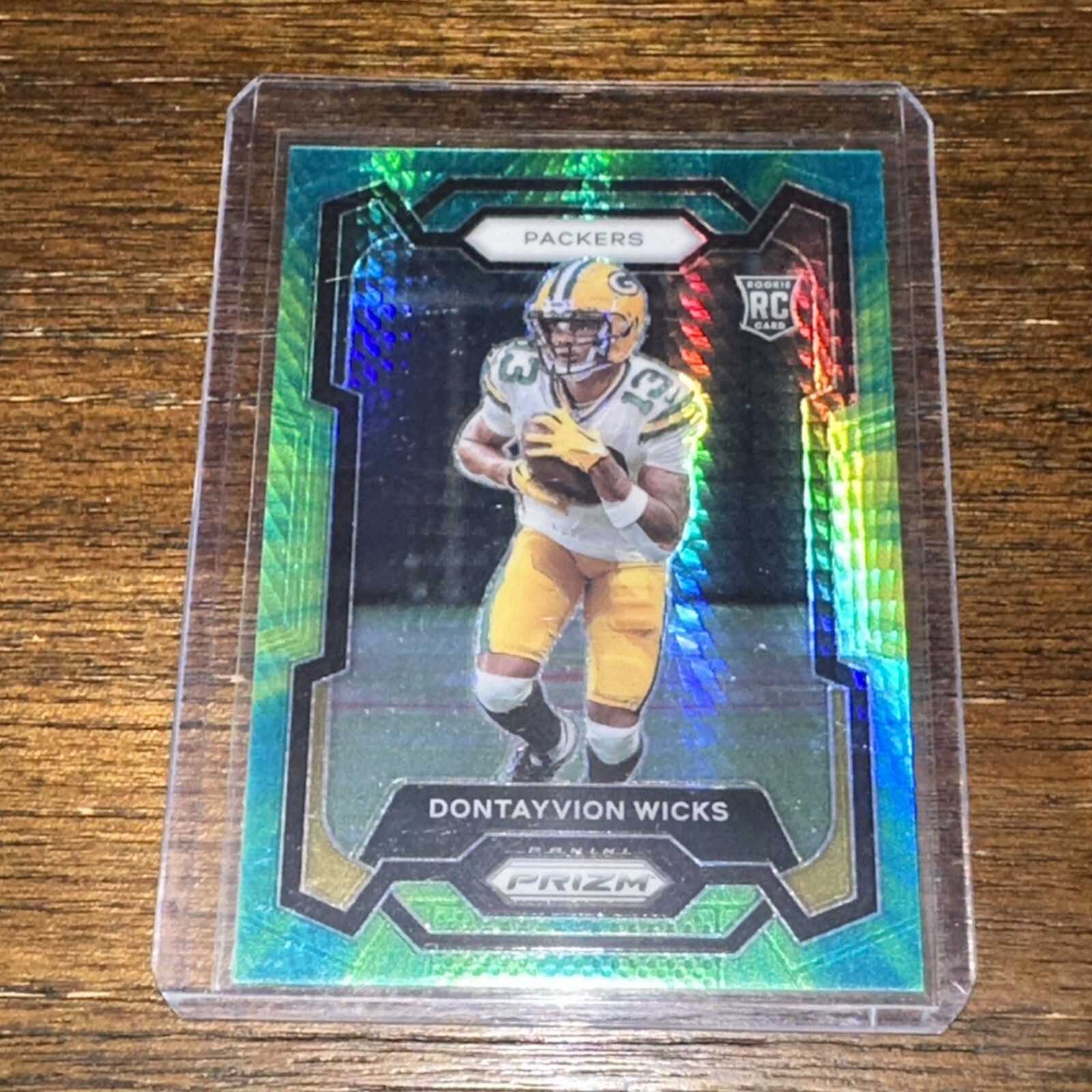2023 Panini Prizm #333 Dontayvion Wicks Hyper /175 Prizm Rookie