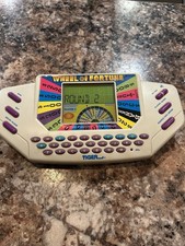 Tiger Electronics Wheel of Fortune Handheld Electronic Game - 7-531-04