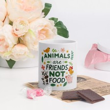 White glossy mug with vegan friendly design f...