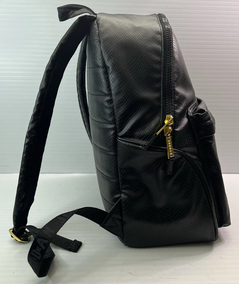 MOCHILA REGAL NIKE AIR JORDAN IMITACIÓN CUERO -Negro/Dorado -Monograma 9A0136-429 Usada en Excelente Condición Foto 2 de 4