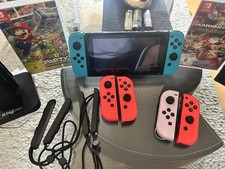 Nintendo Switch Konsole mit Dock & Joy-Cons + Mario Kart 8 Deluxe & Mario …