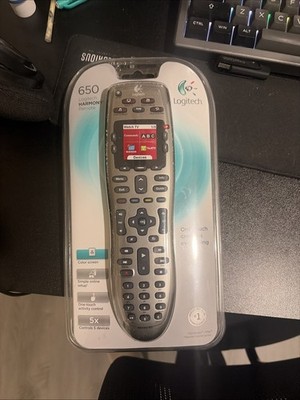 New/Sealed. Logitech 915-000159 Harmony 650 Universal Color Screen Remote TV/DVD