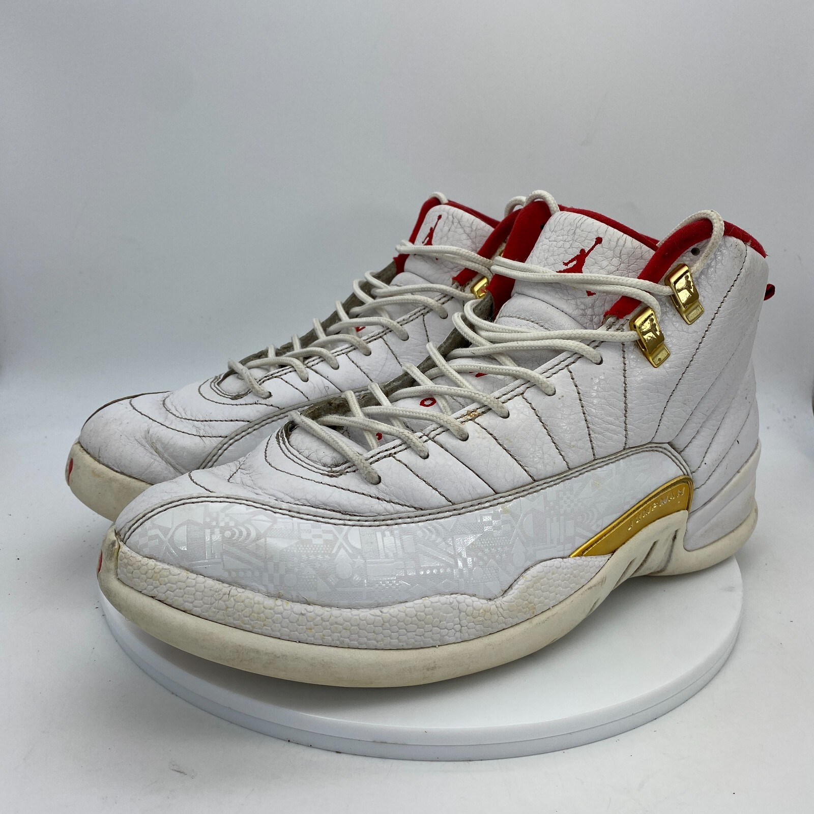 red and gold jordans 12