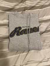 Gently used gray Baltimore Ravens hoodie in excellent condition.