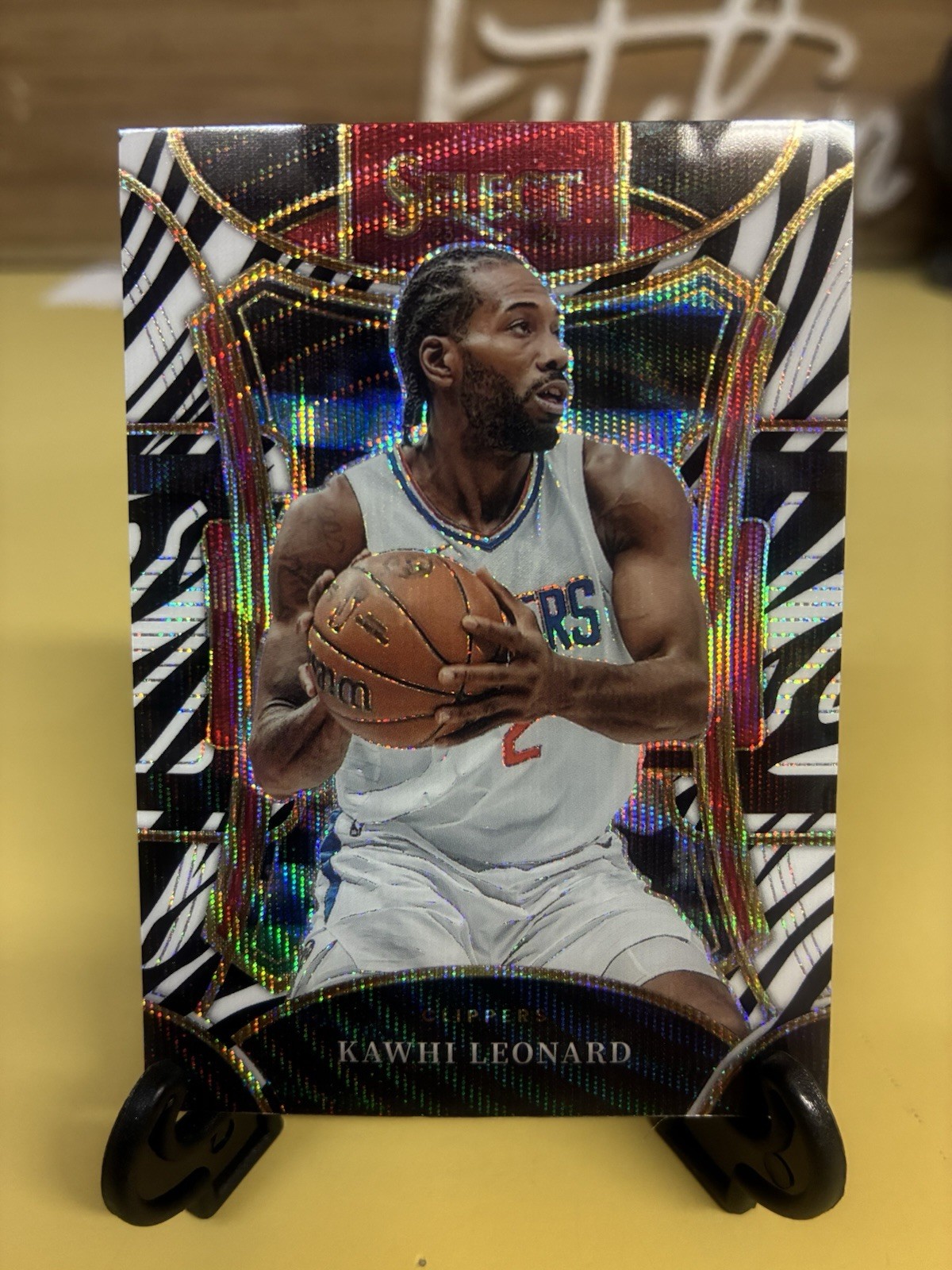 2023-24 Panini Select - Mezzanine Level #377 Kawhi Leonard Zebra Prizm Case Hit