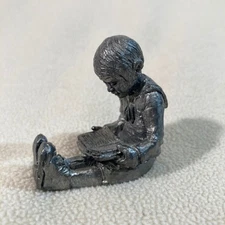 Michael Ricker Pewter "Boy Reading Book" from The Park City Town Hall Grouping